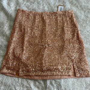 Boutique mini skirt I’m Rose Gold NWT